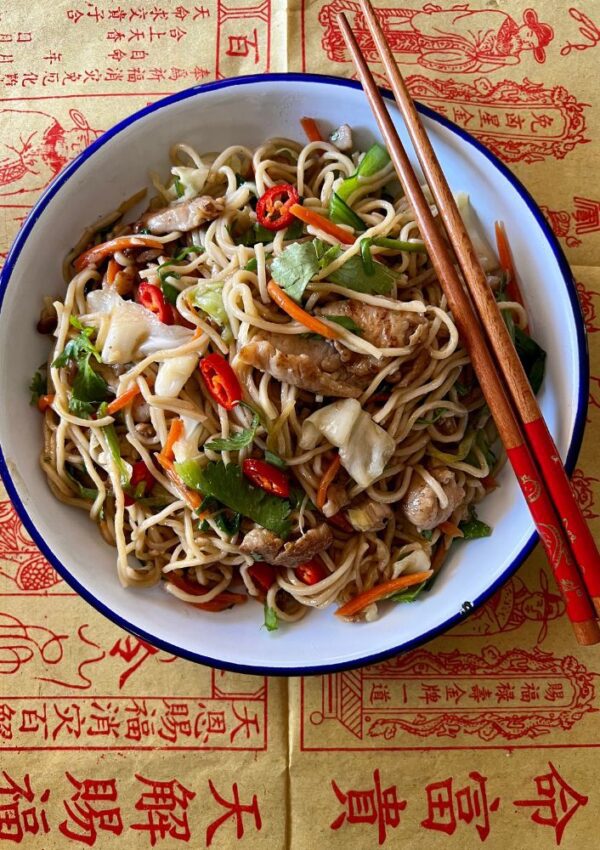 Chow Mein in a bowl with chopsticks