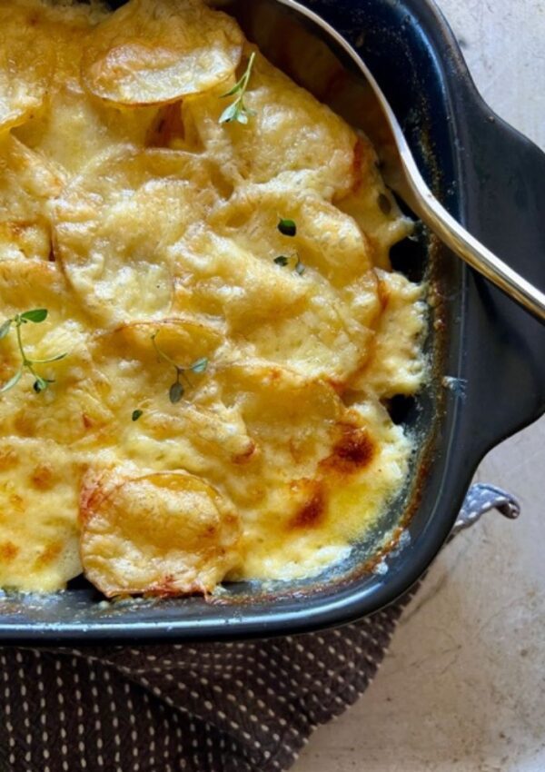 Creamy Potato & Pumpkin Bake a dish with spoon