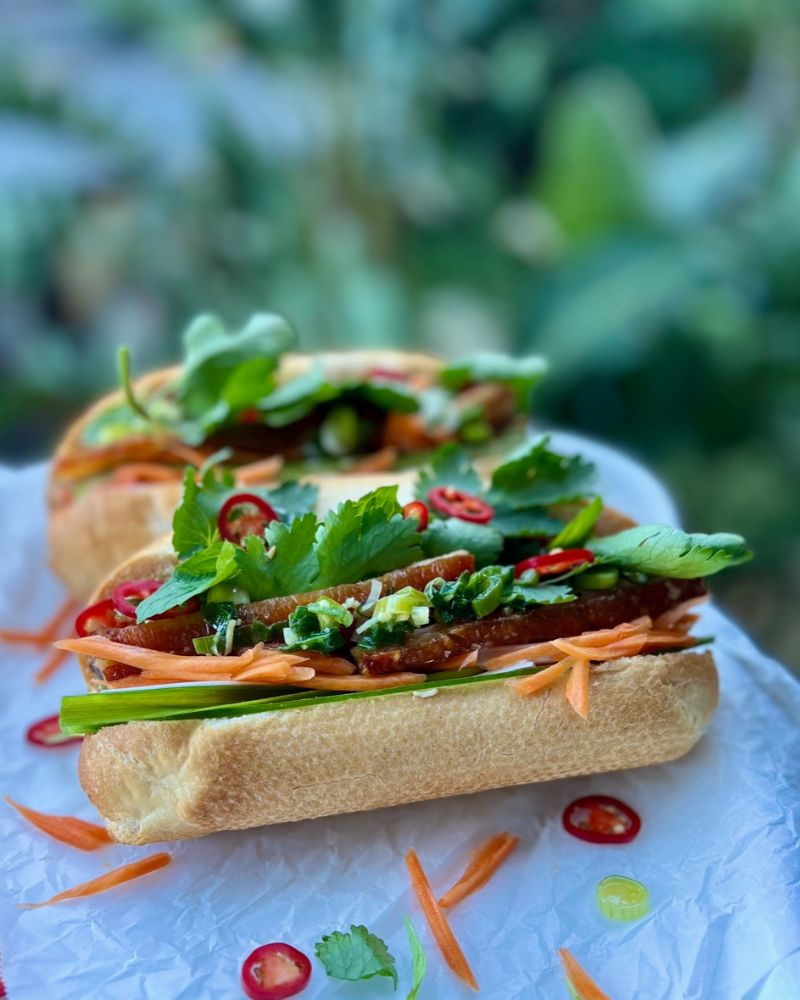 two Crispy Pork Belly Bahn Mi on tray