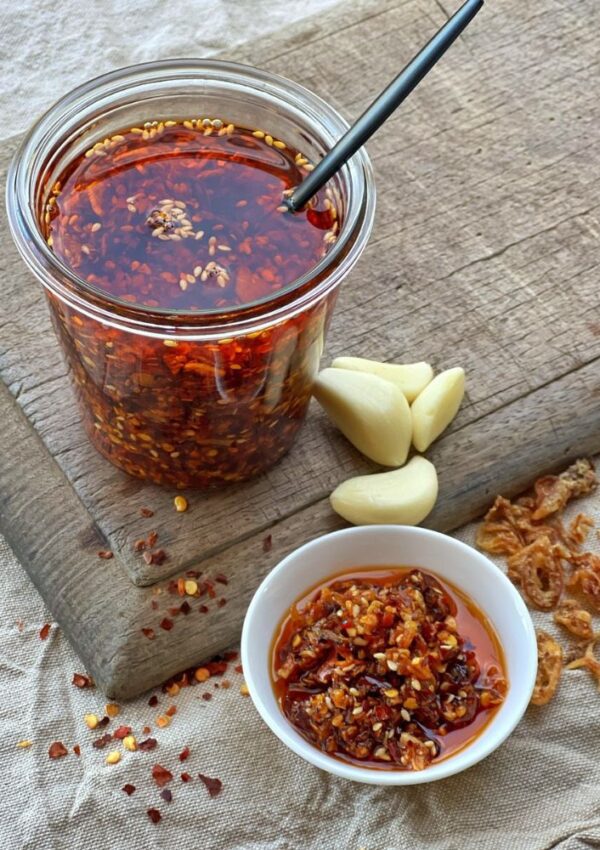 Chilli Garlic Crisp Oil in jar and saucer