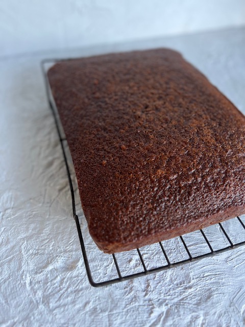 STICKY GINGER CAKE ON WIRE RACK