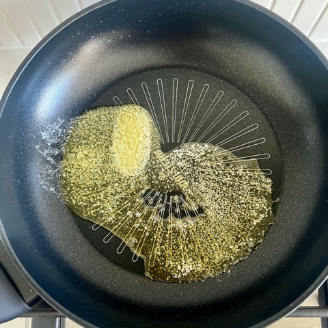 butter melted in a non-stick pan