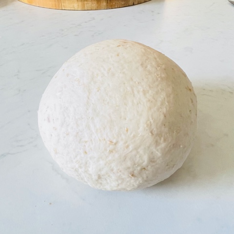 Pita bread dough rolled after kneading 