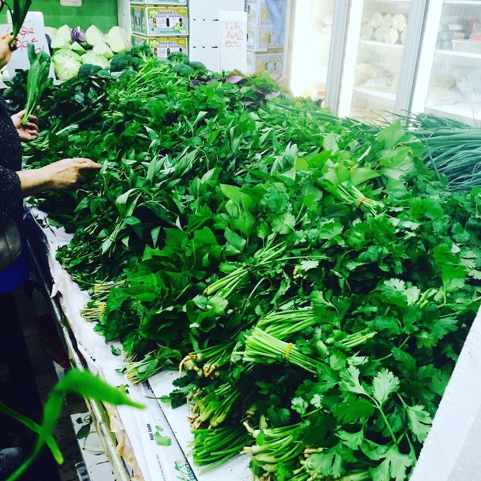 huge bundles of herbs on table