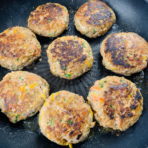 rissoles cooking in pan