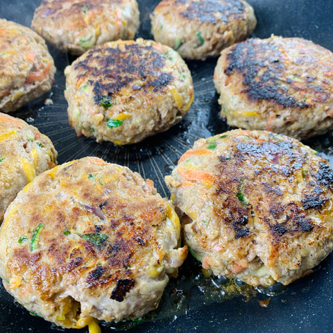 rissoles cooking in pan