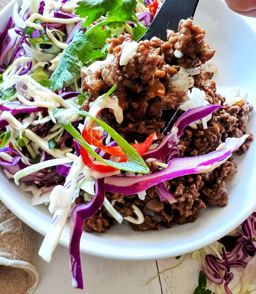 asian beef on fork with slaw