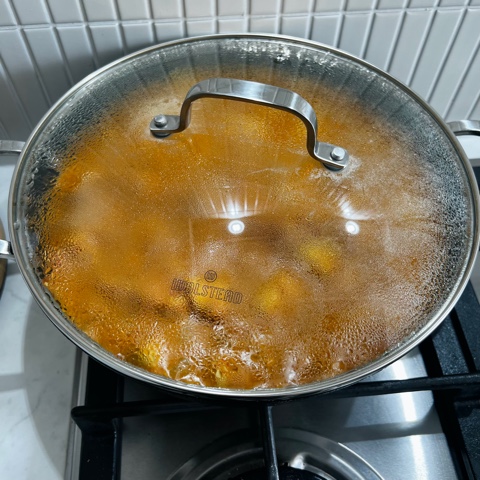 curry cooking with the lid on