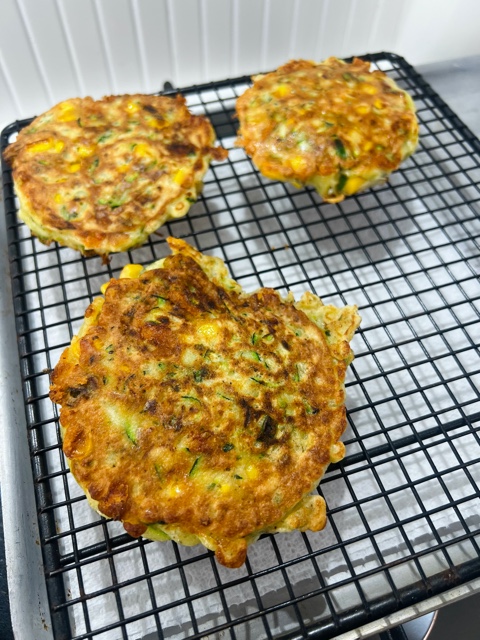 fritters cooling on a wire rack
