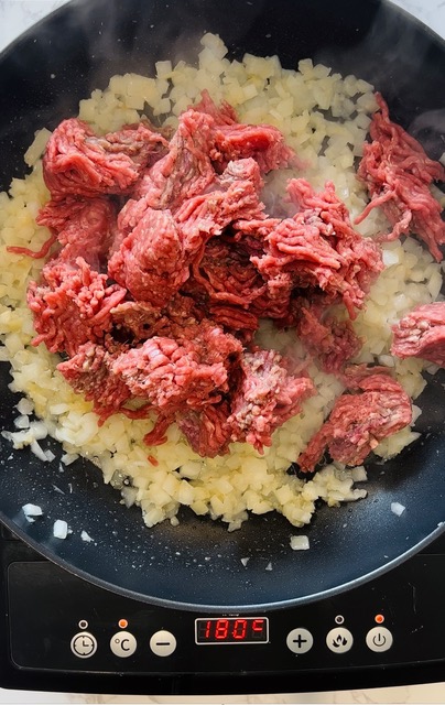 beef mince added to frypan