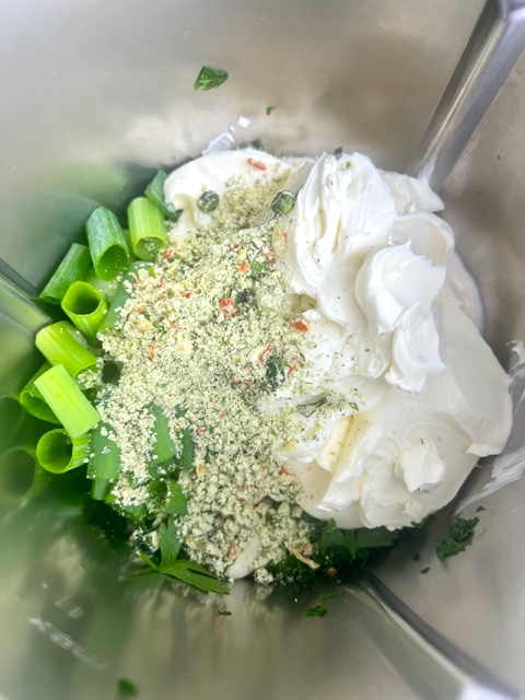sour cream, spring onions and soup mix in thermomix bowl
