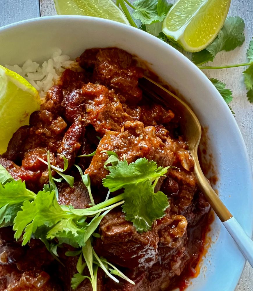 close up of Mexi Chilli Beef in a bowl with fork