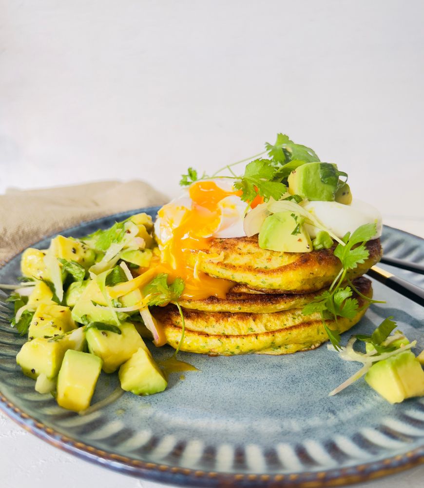 fritters and salsa on blue plate