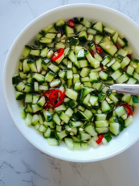cucumber dipping sauce in white bowl