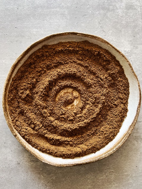 7 spice mix swirled on beige plate