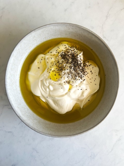 yoghurt, lemon juice and oil in a bowl