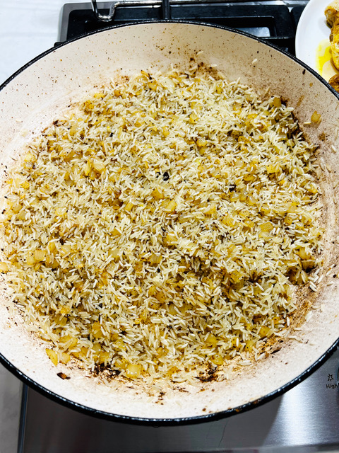 onion and rice cooking