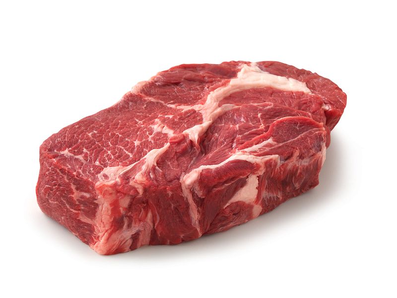 raw chuck steak piece on white background