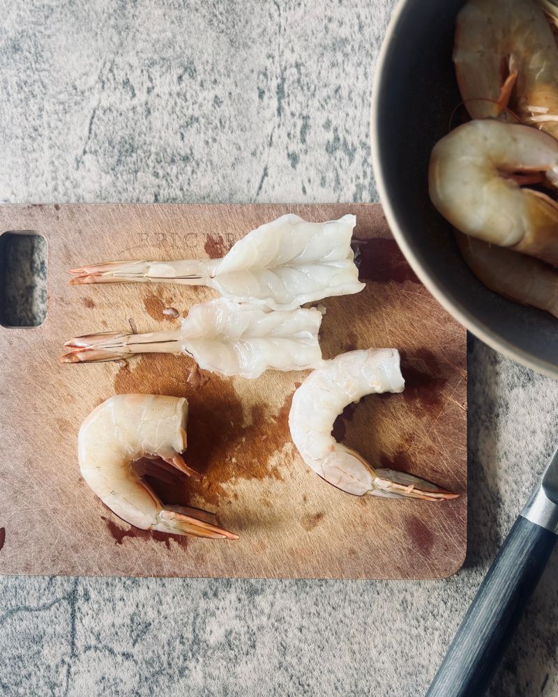 prawns peeled on a chopping board