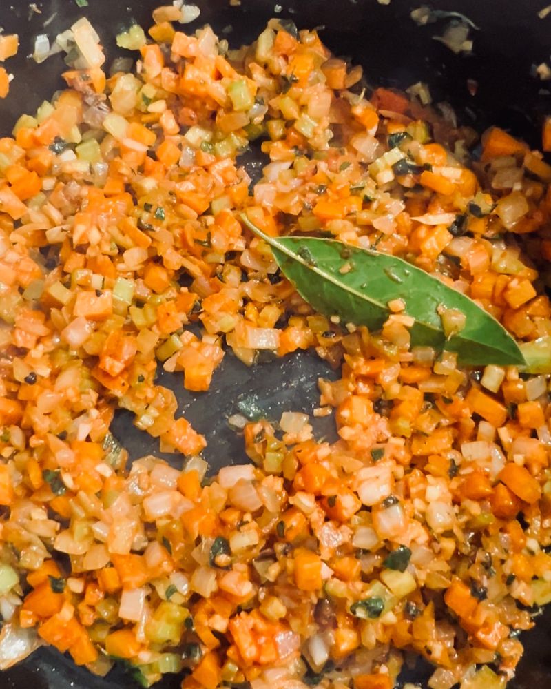 diced vegetales cooking in a pot
