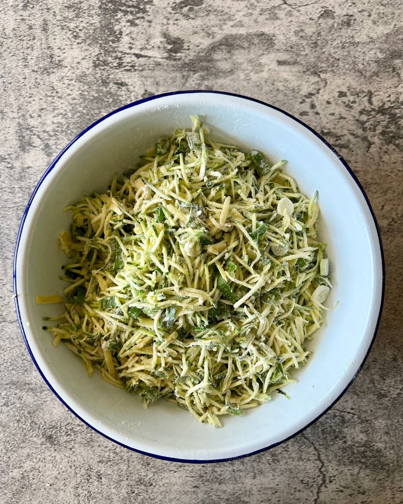 zucchini slice mix in a white bowl