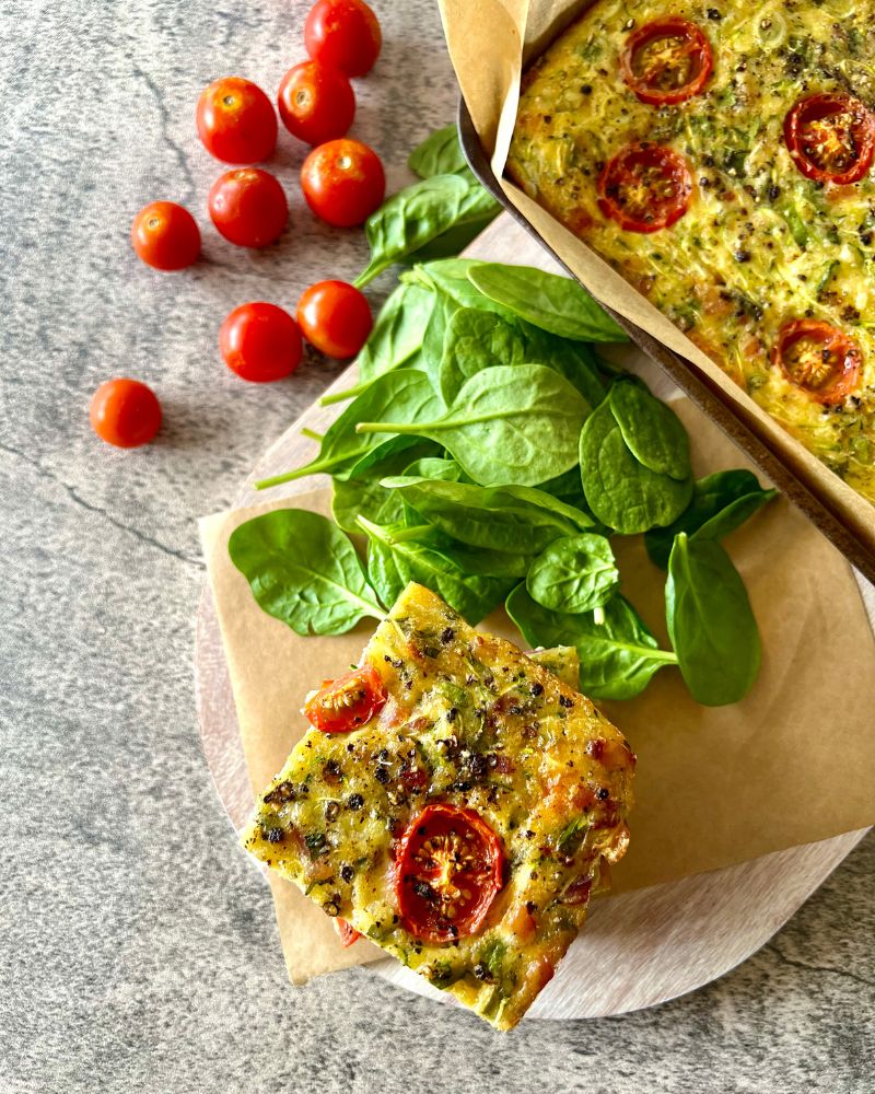 overhead of zucchini slice in pan and stacked up