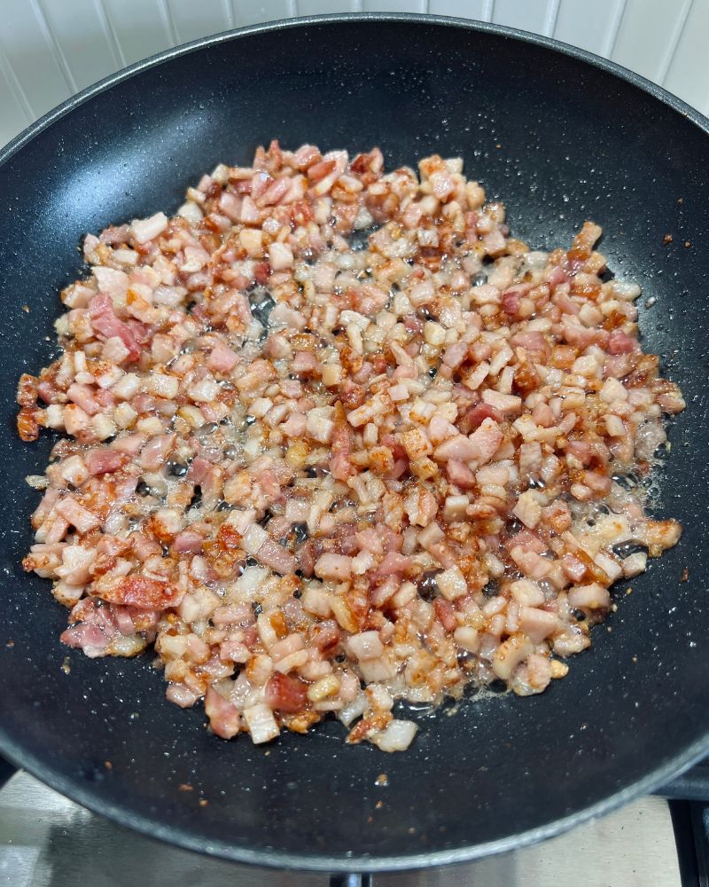 bacon cooking in pan