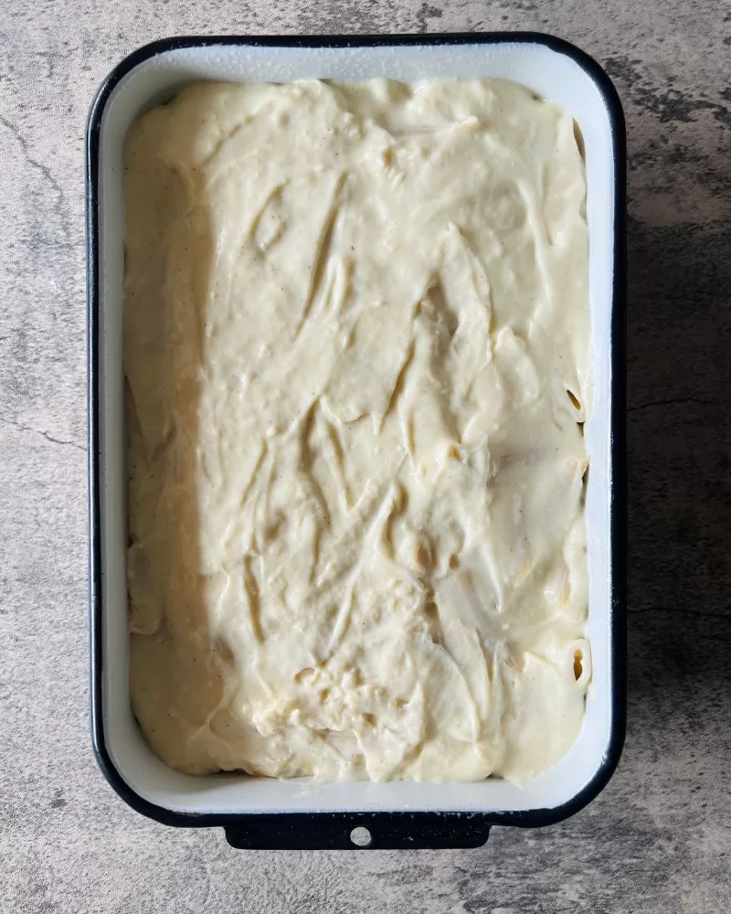 bechamel sauce in a baking dish