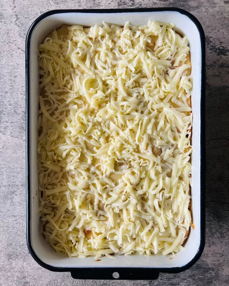 mozzarella cheese sprinkled over pasta bake