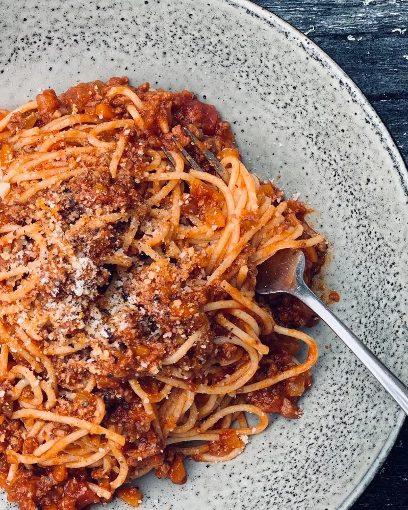 spaghetti bowl in a bowl with fork