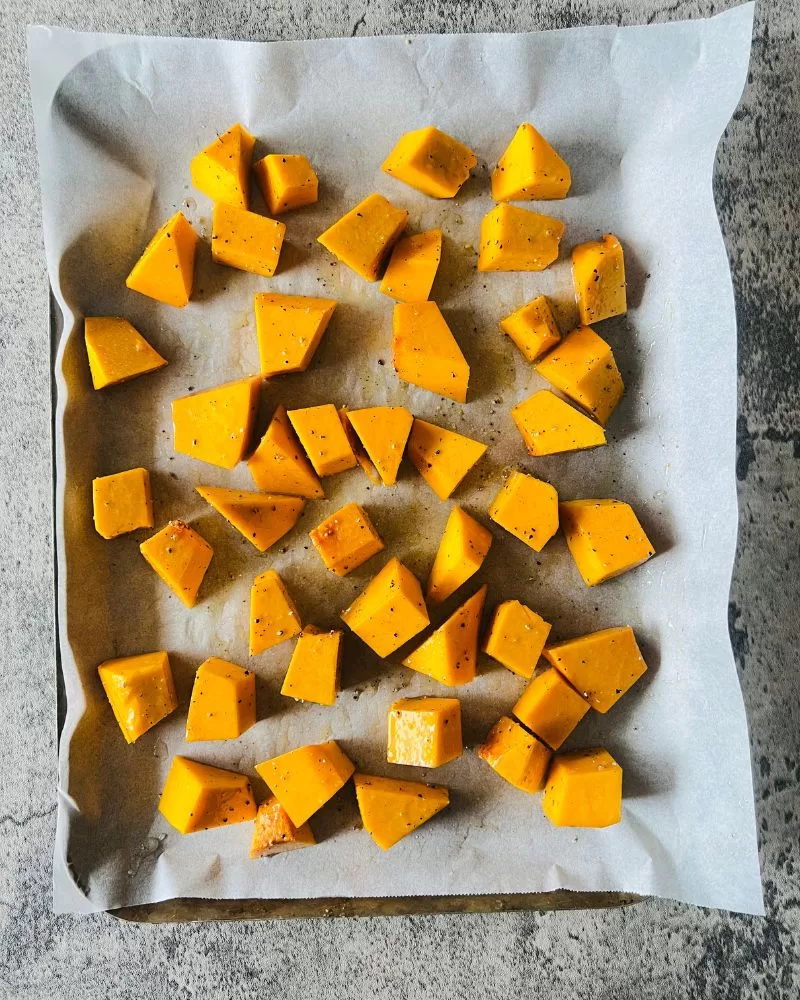 diced pumpkin on a tray