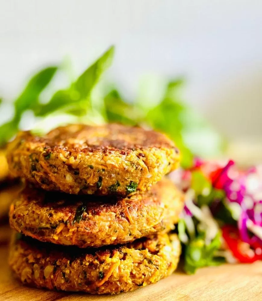 veggie patties stacked on a board