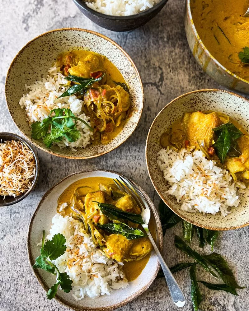 bowls of fish curry with rice