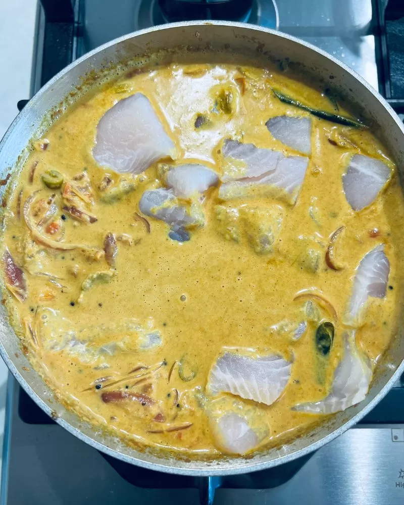 cooking fish kerala curry in pan