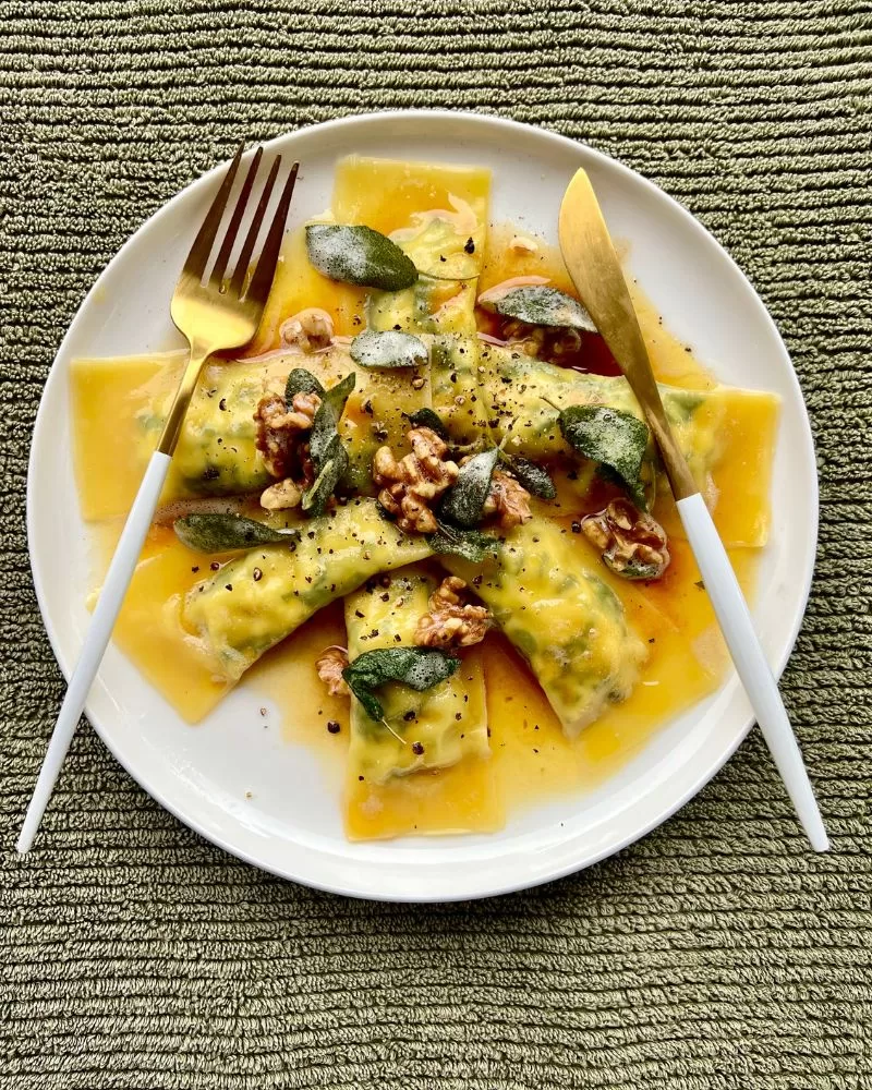 ravioli on plate with knife and fork