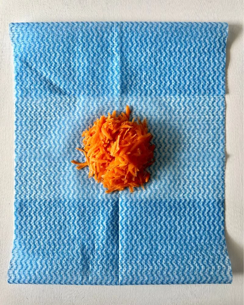 grated carrot on cloth