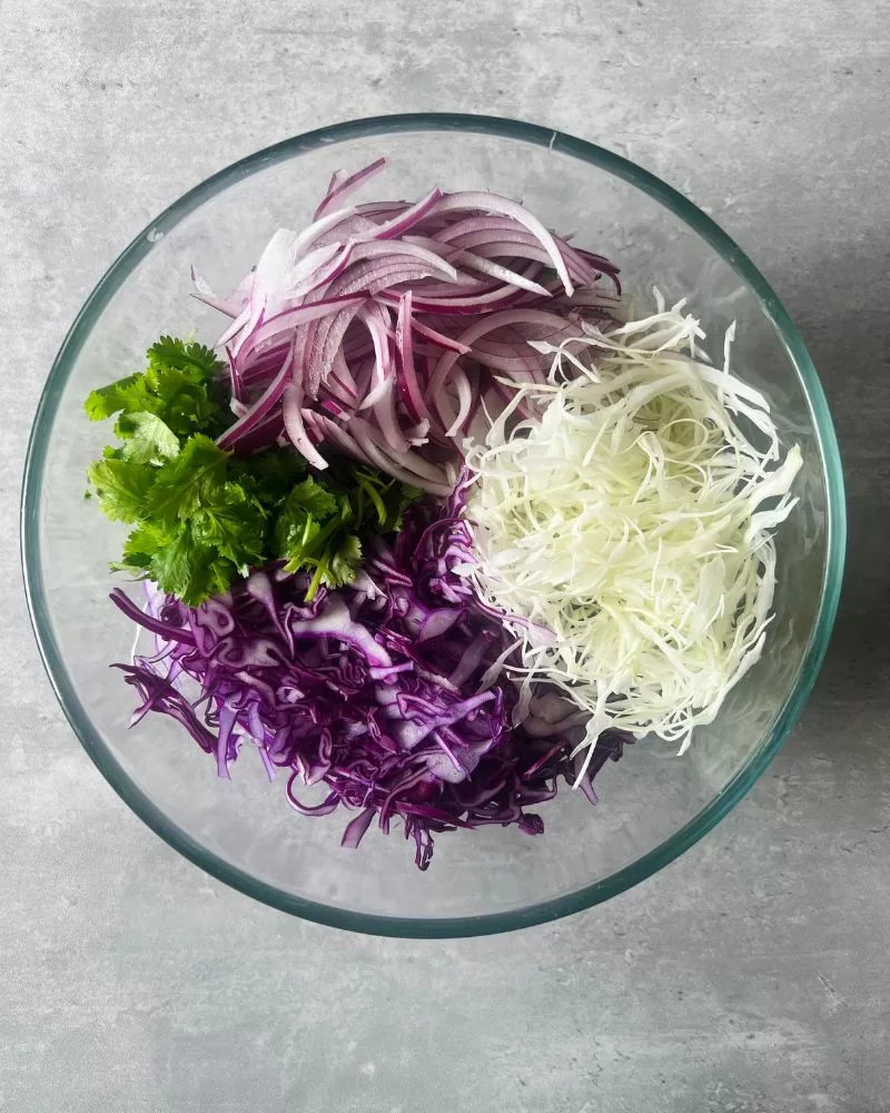 slaw ingredients in a bowl