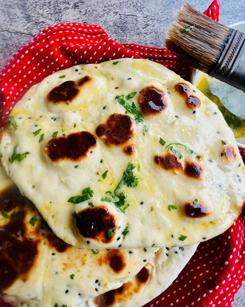naan breads brushed with galric butter