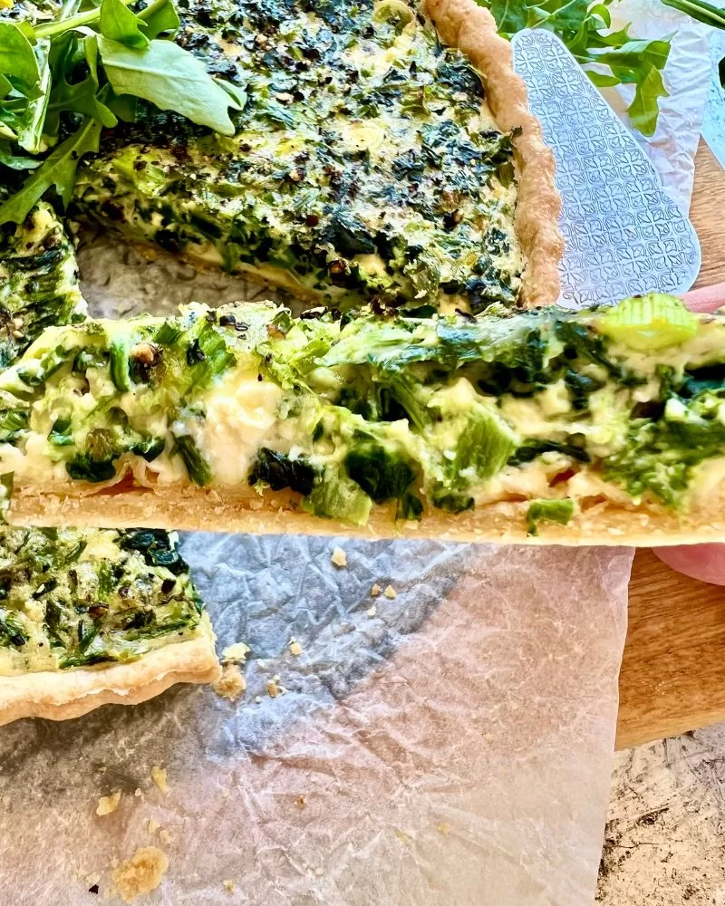 side view looking into spinach quiche wedge