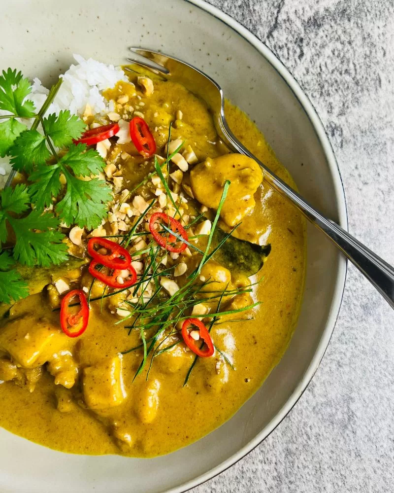 satay chicken curry in bowl with rice