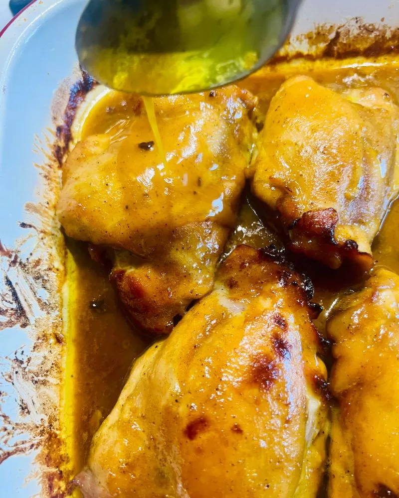 basting the curried honey chicken