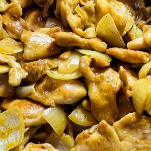 satay chicken stir fry in a pan