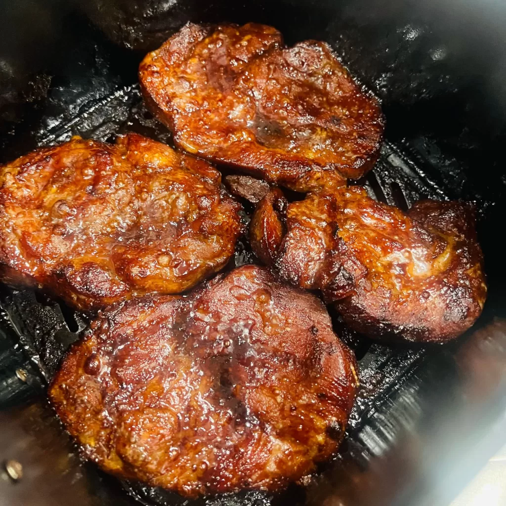 cooked pork in air fryer basket